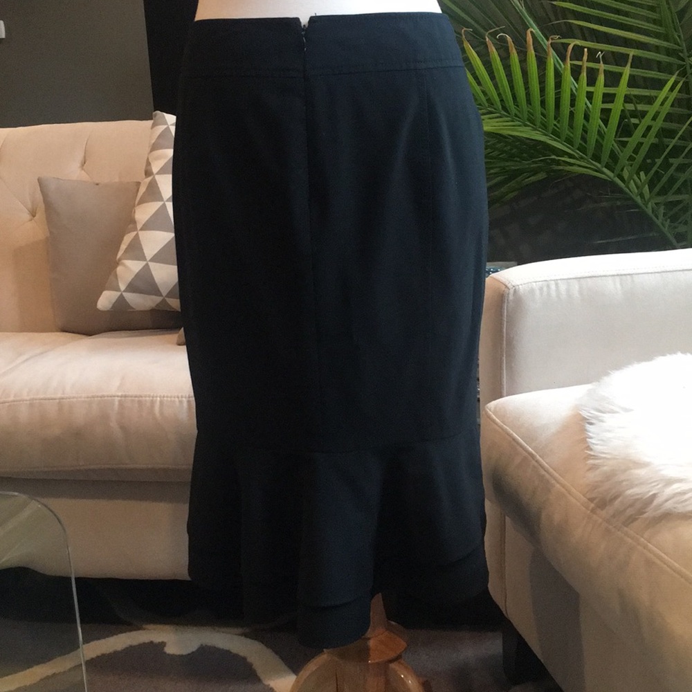 Black pencil skirt with back ruffle